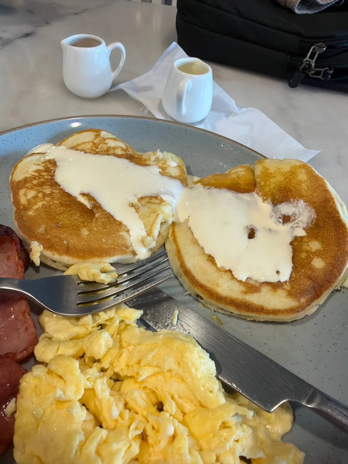 Pancakes eggs bacon American breakfast Lunch Box Cafe